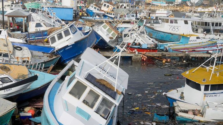 'Monster' Hurricane Beryl upgraded to category five as it slams into Caribbean