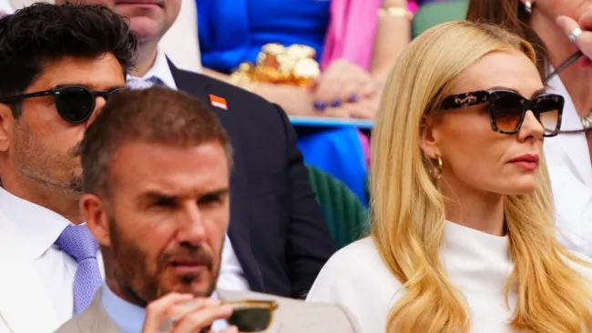 David Beckham and Katherine Jenkins sit inches from each other after awkward clashes and affair rumour