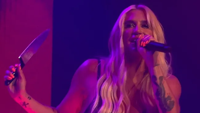 Kesha sparks concern as she wields knife on stage to celebrate new song Joyride