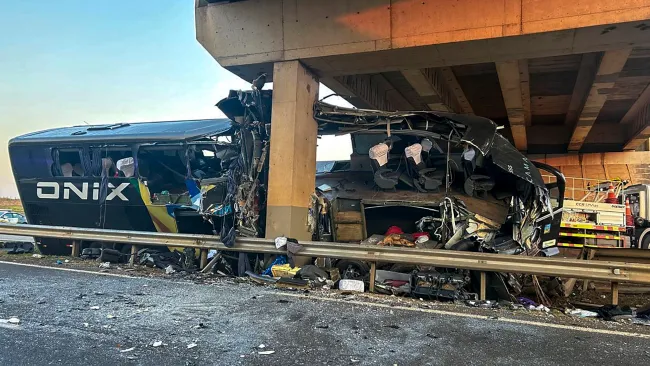 At least 10 killed after bus smashes into bridge pillar on motorway