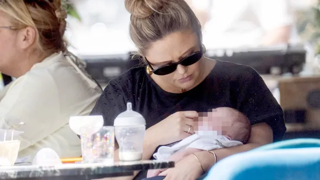 Emily Atack dotes on newborn son as she’s seen outside for first time since giving birth