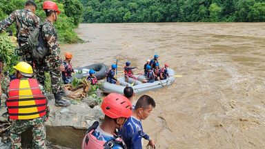 Dozens missing in Nepal after landslide triggered by heavy monsoon rain sweeps two buses into river