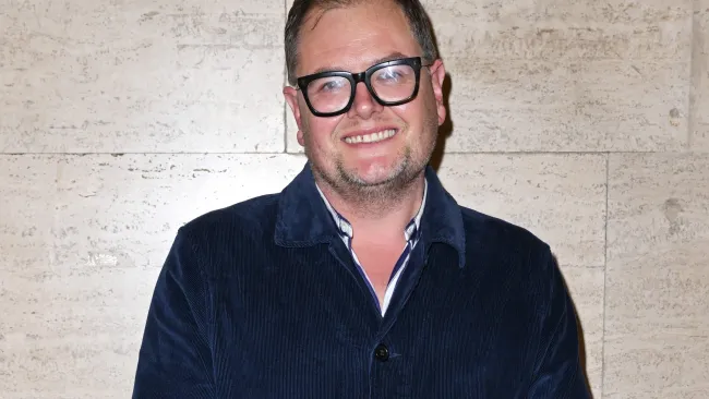 Inside Alan Carr’s private life including famous football star dad