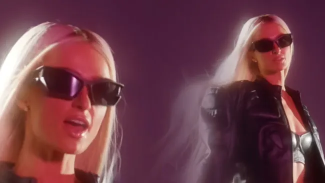 Paris Hilton gyrates in black leather underwear for sizzling music video transformation