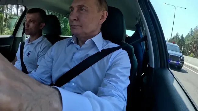 Putin drives a Lada without a bulletproof vest on after Trump’s narrow miss