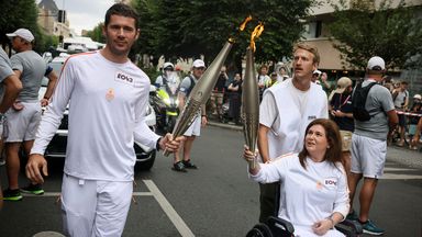 Journalist wounded in Israeli strike on Lebanon carries Olympic torch in France