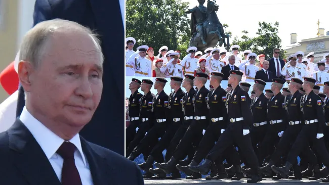 Putin looks like he’d rather be anywhere else at Russia’s Grand Naval Parade