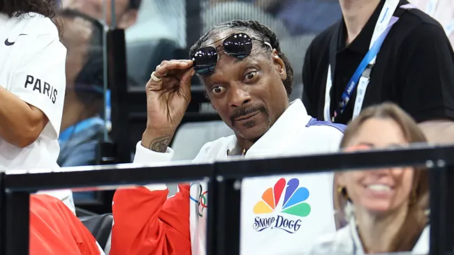 Fans are obsessed with Snoop Dogg’s ‘dope’ Olympics pin that’s so on-brand for the rapper