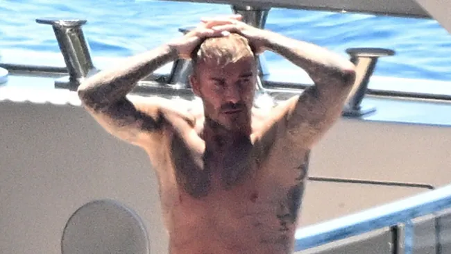 David Beckham gives himself a good hose down in his tighty whities on luxury yacht