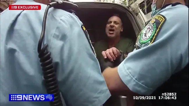 Game show host seen swearing at police while being arrested for ‘violent and degrading’ assault