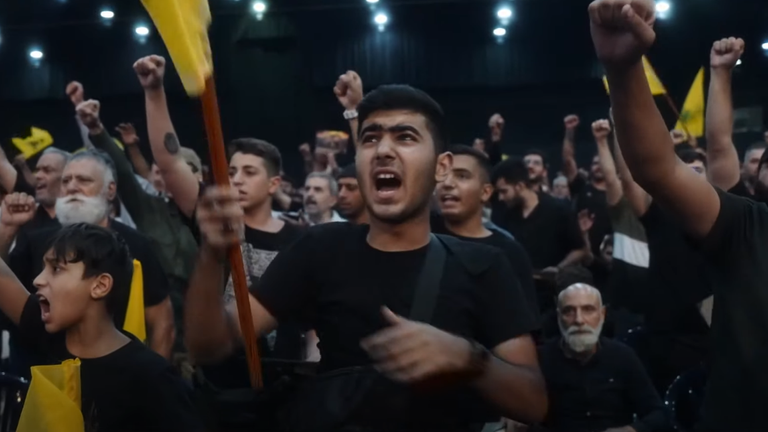 Inside a Hezbollah rally: 'We will win this war - being martyrs is good'