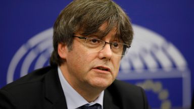 Police search sewers as former Catalan president Carles Puigdemont vows to return to Spain