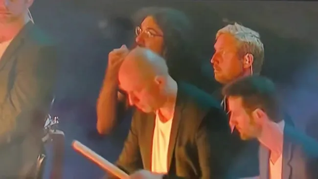 Man becomes highlight of Olympics closing ceremony by casually eating noodles on stage