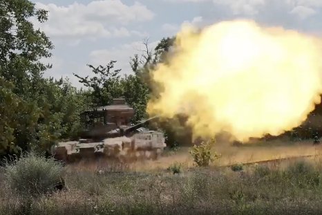 Precision Drone Strike Destroys Russian Tank Through Open Hatch