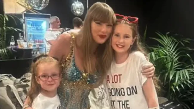 Taylor Swift beams and wraps her arms around family of Southport stabbing victim