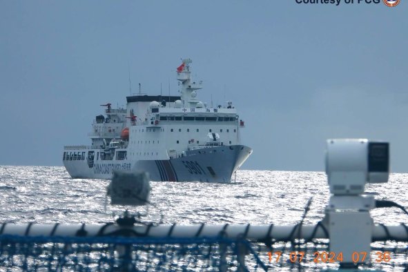 US Ally Meets China's 'Monster Ship' Guarding Artificial Islands