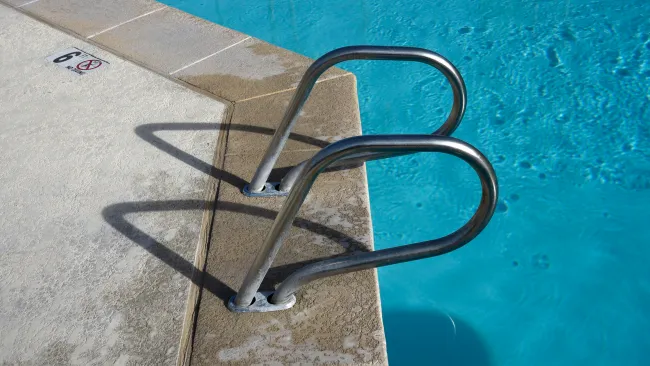 Squatter sues homeowner after he paralysed himself jumping into swimming pool