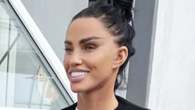 Katie Price grins as she shows off healed ‘£10,000’ new face to full effect