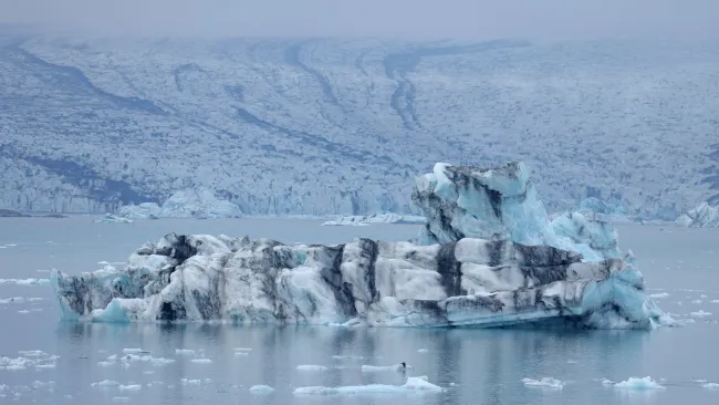 One dead and two missing after ice cave collapses onto group of tourists