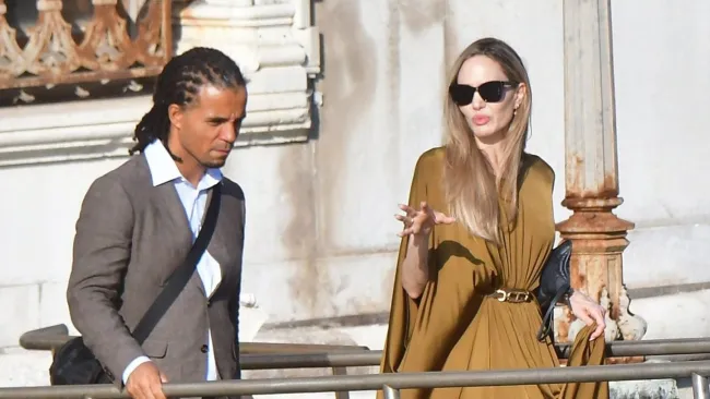 Angelina Jolie sparks dating rumours with brother of huge 00s UK music icon in Venice