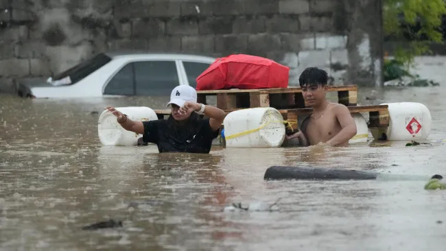 Pregnant woman among 14 killed after Tropical Storm Yagi triggers landslides