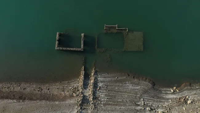 Sunken village reemerges in Greece as drought dries up lake