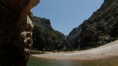 Majorca: British woman found dead and British man missing after being 'swept away in flash flood' while hiking