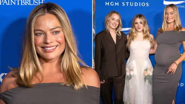 Margot Robbie glowing as she graces red carpet with baby bump for first time