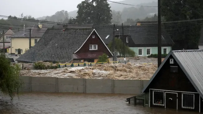 ‘Catastrophic’ moment entire town is submerged in water after dam bursts