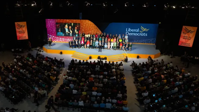 Lib Dem member, 57, arrested after woman groped at conference party