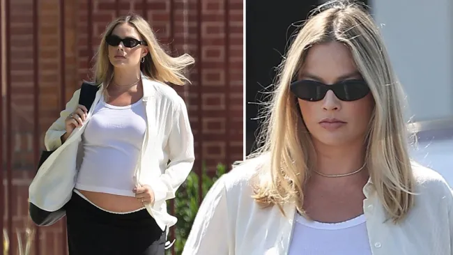 Heavily pregnant Margot Robbie exposes bare baby bump on errand-run