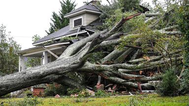 Hurricane Helene kills at least 33 - as dozens trapped on roof of flooded Tennessee hospital